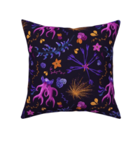 A repeat pattern in bright neon pink, orange, purple, and blue, of unusual plants and flowers including: Orchid Italica (the Naked Man Orchid), Jade Vine, Mimosa tree flowers, Mountain cornflower, as well as small roses, leaves, and simple vines. The background is black. The pattern is demoed on a square pillow on a white background.