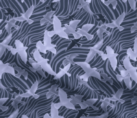 A repeat pattern of a flock of birds flying every which way, outlined in periwinkle, filled with different shades of indigo and purple with glowing highlights on each bird to make out their shape. They are flying over a series of dark blue fluid like curvy stripes that cover the entire background. The pattern is demoed on a piece of rippling fabric.