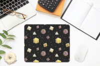 A repeating pattern of 7 Dungeons and Dragons Dice in Nonbinary Pride Flag colors: Yellow, purple, and white, on a black background. It is demoed on a rectangular mousepad with rounded corners on a desk next to a yellow flower.