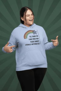 A cartoon of a smiling blue star at the end of a rainbow. Below in all caps black letters it says Yes Thank you I have tried yoga please suggest literally anything else. It is demoed on a light blue pullover hoodie on a sassy east asian woman.