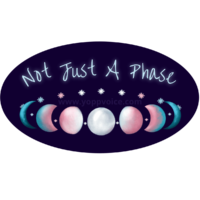 A ring made of stars and the phases of the moon that floats under the pale blue glowing words, Not Just a Phase. The moons and stars are colored in a textured gradient with the colors of the transgender pride flag: baby blue, white, and pink. The background is a dark blue oval. There is a watermark that says www.yoppvoice.com
