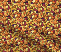 A vibrantly colorful repeat pattern of stained glass in abstract flowing shapes in vivid shades of yellow, orange, magenta, and purple divided by lines of black. The pattern is demoed on a piece of rippling fabric.